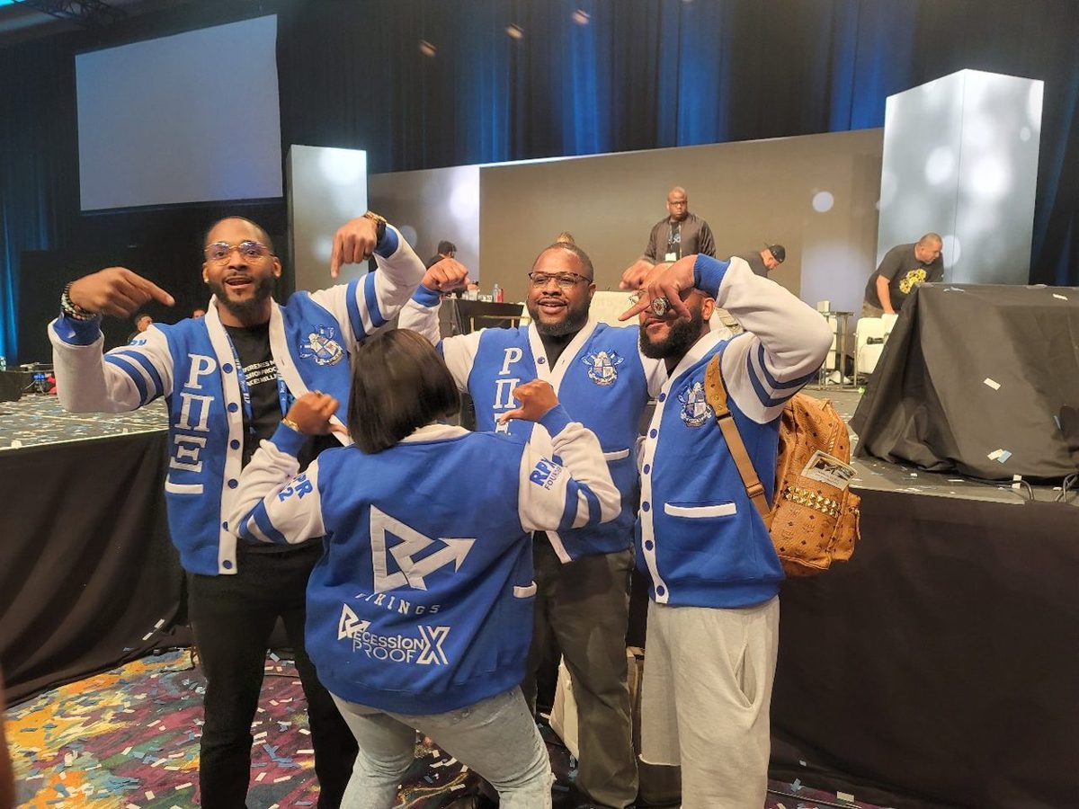 Members in Recession Proof jackets at the chapter convention.
