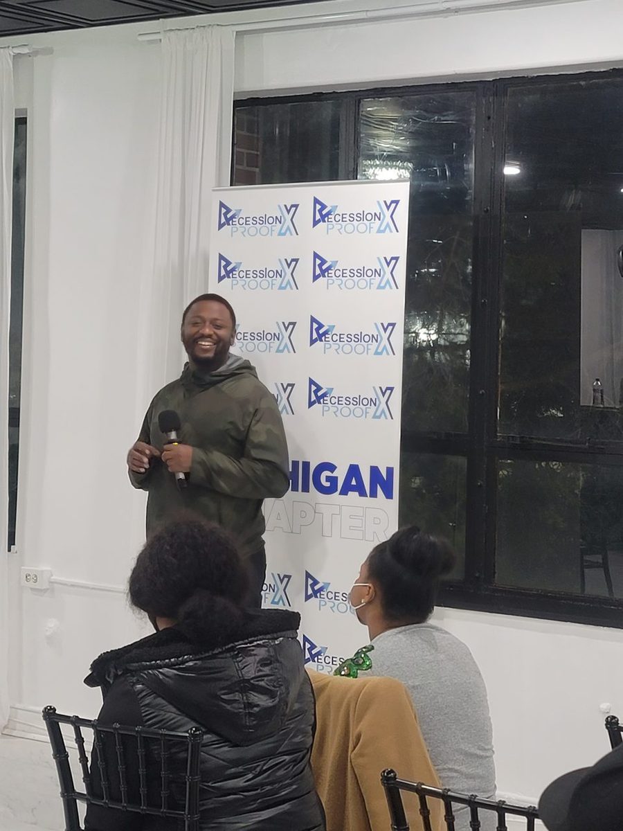 A speaker addressing the room at a Recession Proof Michigan event.